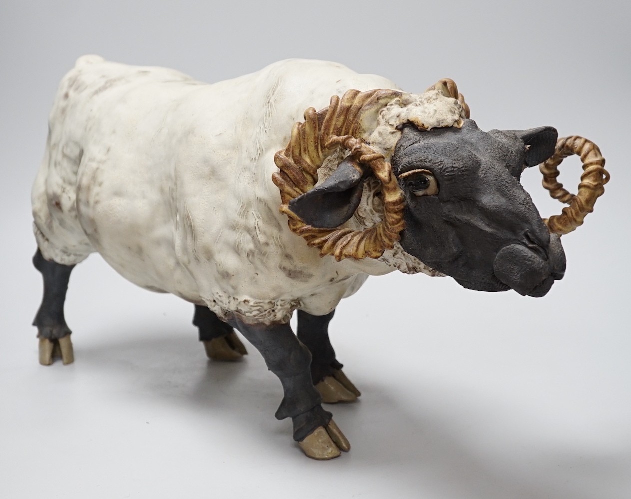 A British studio pottery model of a ram, 56cms long x 28cms high